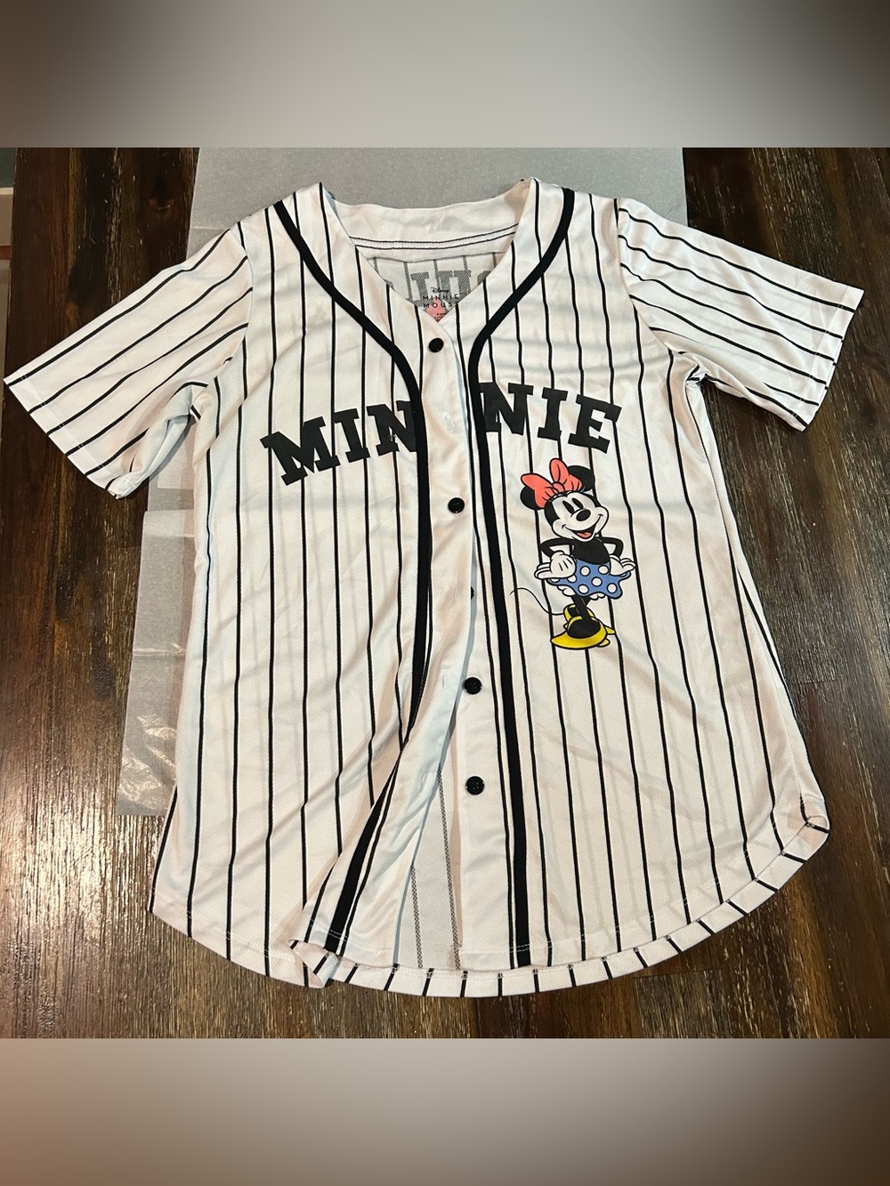 NWOT Disney baseball jersey  black pinstripes and a graphic of Minnie Mouse.